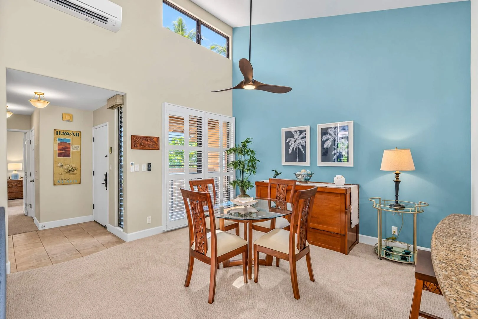 Dining area and entry hallway with high clerestory windows